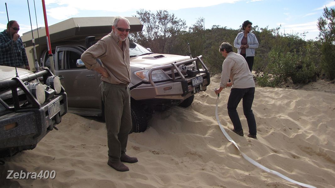26-Heidi gets ready to snatch Wayne off the top of the dune.JPG